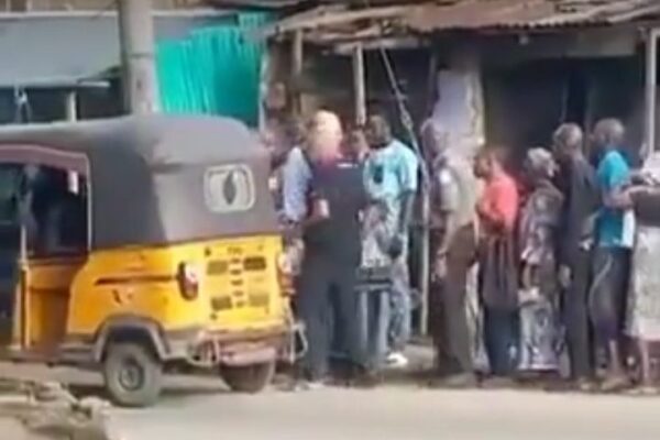 Massive Crowd As Whiteman Shares Bread To Lagos Residents [Video]